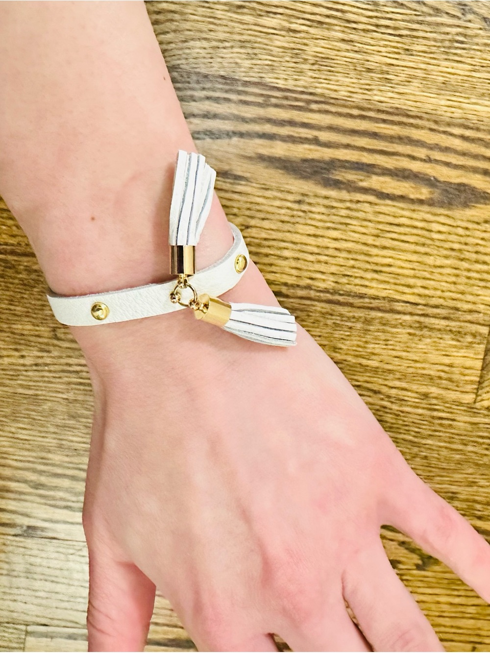 White Wrap Tassel Bracelet with Gold Accents